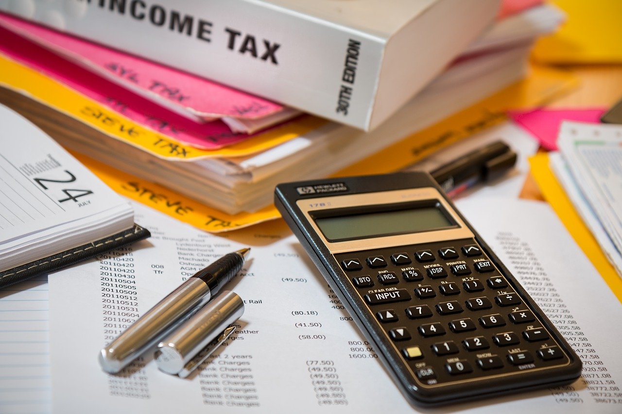 Business tax planning with calculator on desk